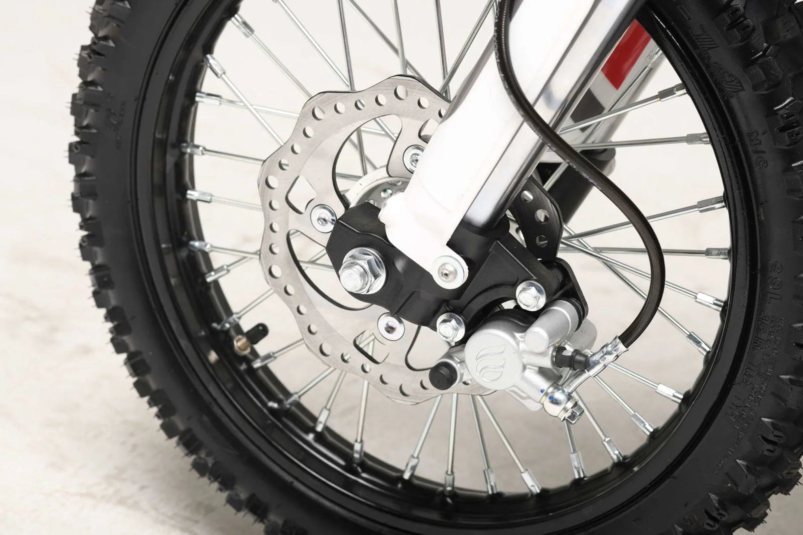 TrailMaster MK125 Dirt Bike 4-Speed Manual Dual Disc Brakes, Electric Start (14/12), Ages 12 and up