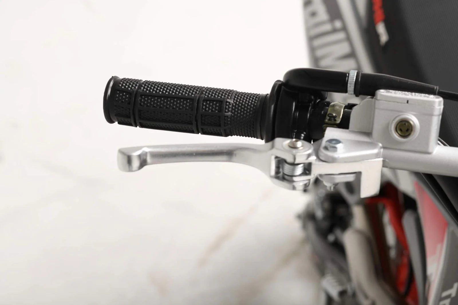 TrailMaster MK125 Dirt Bike 4-Speed Manual Dual Disc Brakes, Electric Start (14/12), Ages 12 and up